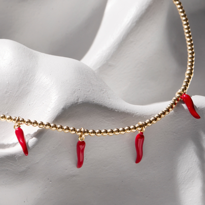Collar forma de Chili 14 kilates